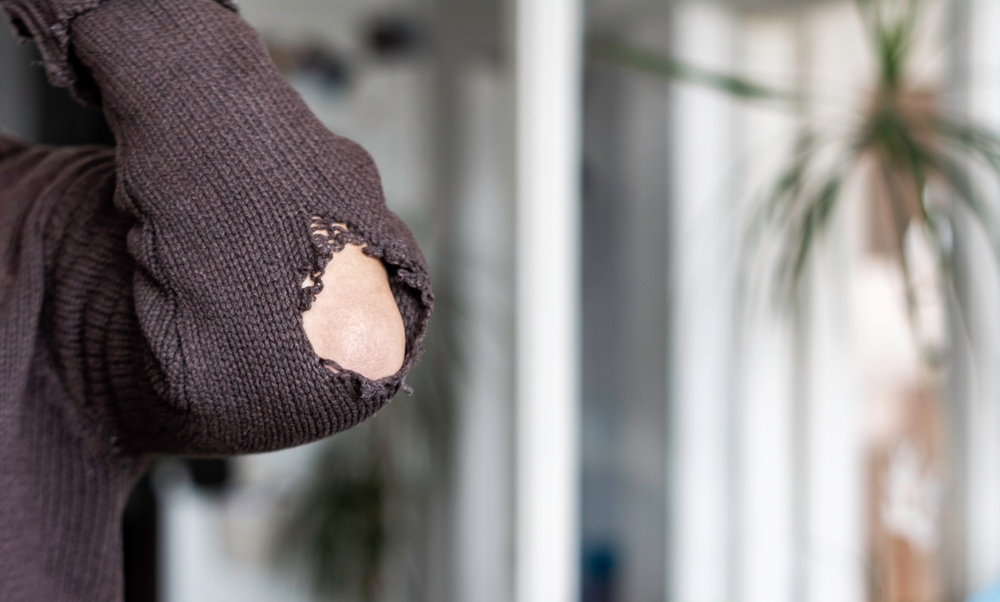 Autistic man insists collection of holes held together by threads is “just a little worn”