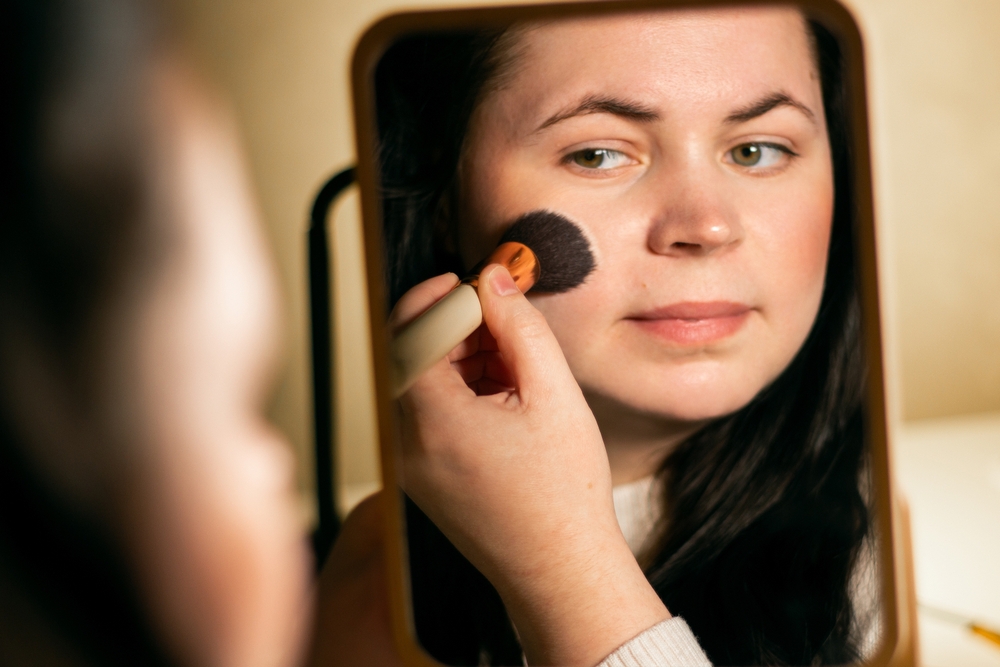 Steal her look! Autistic woman throws makeup in general direction of face and prays