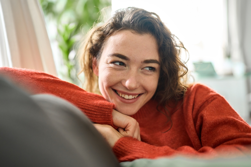 Grinning autistic woman repeats pun in case you didn’t hear it the first three times